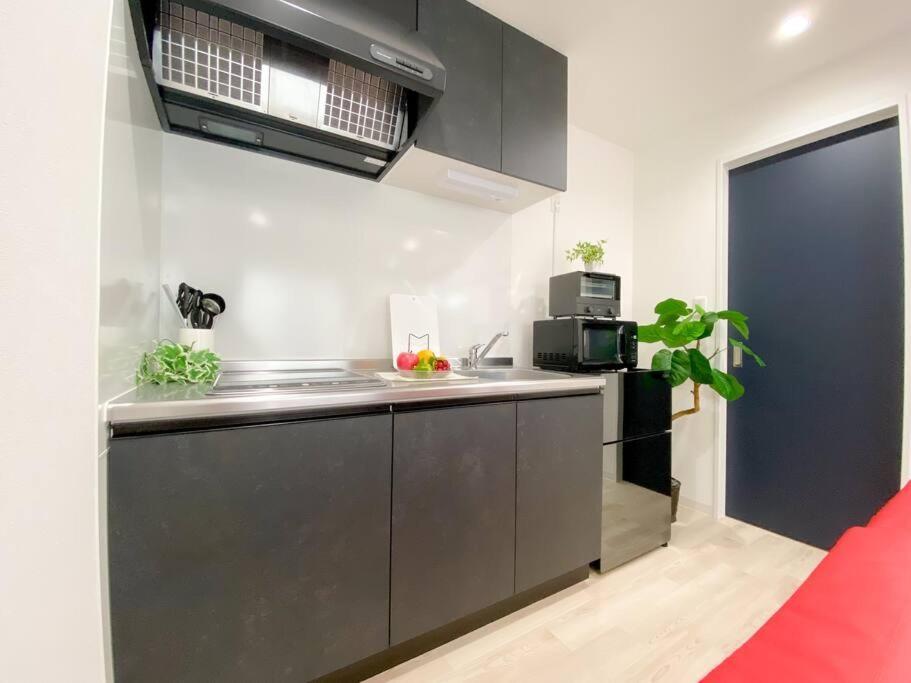 Residential Hotel Glitter Usjまで1駅5分 오사카 객실 사진
